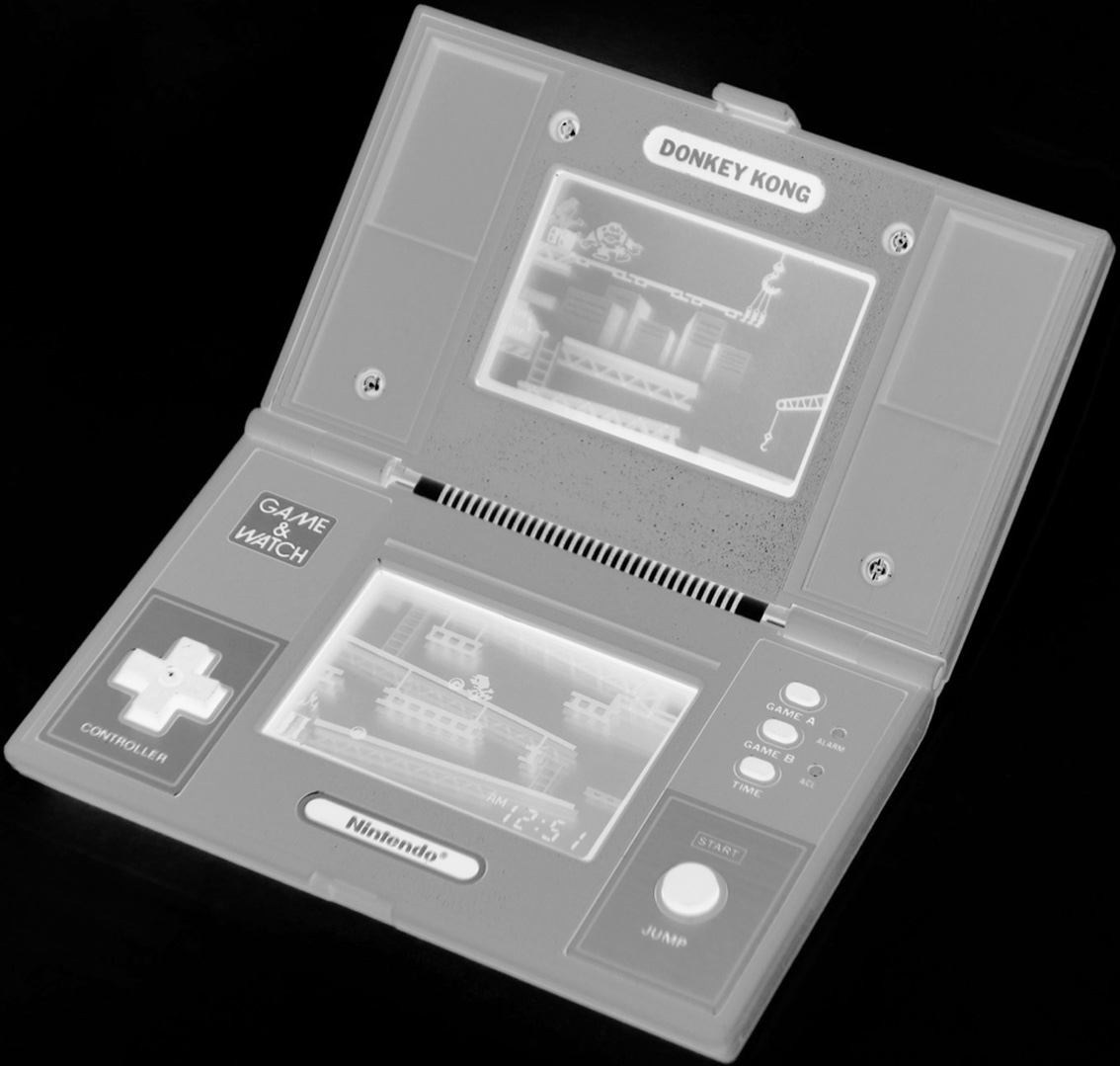 圖 1.4 Game & Watch《大金剛》與十字方向鍵(D-pad)的導入。
